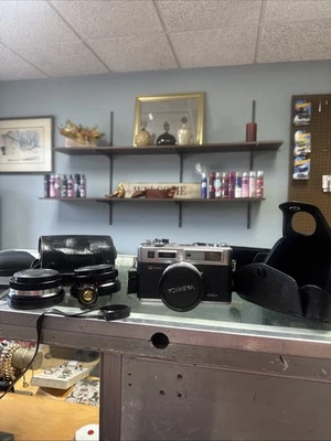 yashica camera electro 35 and extra lenses - Image 1 of 4