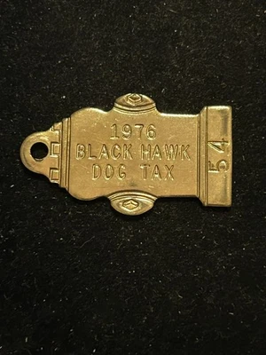 1976 年黑鹰科罗拉多州税币狗牌许可证 #54 — 第 1/2 张图片