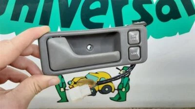 1990 Ford Probe Driver Side Interior Door Handle Assembly With Lock Switch - Image 1 of 2