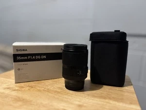 Sigma 35mm Lens F1.4 DG DN for Sony E Mount W/ PrismLensFX Moody FX Filter - Picture 1 of 7