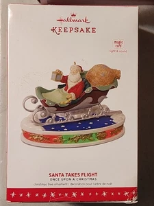 Hallmark 2016 SANTA TAKES FLIGHT Once Upon Christmas Light & Sound Magic Cord - Bild 1 von 5