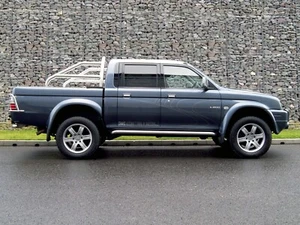 SPORTELLO SINISTRO  POSTERIORE  MITSUBISHI L200 K74 4 PORTE  USATO - Foto 1 di 7