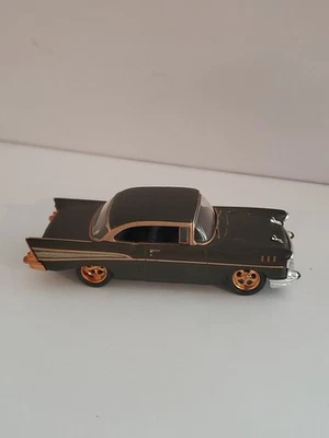 2011 M2 Castline CHASE - 1957 Chevy Bel Air in Black - Gold Rims - Image 1 of 4