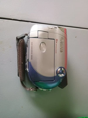 Canon DC210 Camcorder -  Silver blue No Charger Works - Image 1 of 4