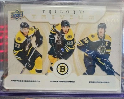 BOSTON BRUINS 23-24 UD Trilogy Hockey Trivium GOLD BERGERON CHARA MARCHAND 34/49 - Image 1 of 3