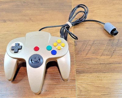 Controlador dorado con cable compatible con N64 con joystick apretado *probado y funciona* Foto 1 de 4