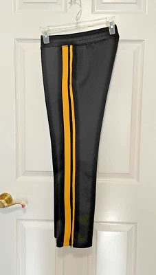 Pantalones deportivos Pam & Gela negros con doble raya amarilla hasta el tobillo para mujer pequeños Foto 1 de 4