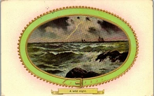 Ships near the rocks - A Wild Night - Gel, embossed, Gilded Vintage Postcard SD1 - Picture 1 of 2