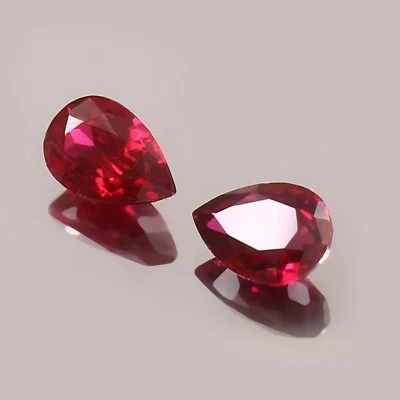 Pigeon Red Mozambique Ruby – Loose Pear Cut Gemstone Pair 9x6mm for Art Deco - Image 1 of 4