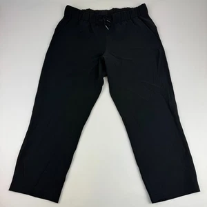 Lululemon Damengröße 8 On The Fly kurze Kordelzughose schwarz gewebt 23" LW6AVMS - Bild 1 von 7