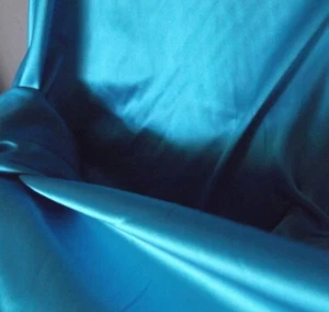 TURQUOISE BLUE SILK SATIN CREPE FABRIC,112 cm wide, SOLD PER METRE OFF ROLL,AUST - Picture 1 of 2