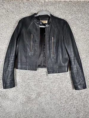 Chaqueta de moto Michael Kors de cuero de cordero negro con bolsillos con cremallera grande para mujer” Foto 1 de 4