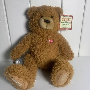 Fuente de soda coleccionable Bearleft Atfork Coca-Cola Coca-Cola oso de peluche 100th - 1999 - Imagen 1 de 12