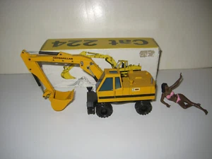 CATERPILLAR 224 BAGGER TIEFLÖFFEL MOBIL PACMAN LOGO #259.1 NZG 1:50 OVP - Picture 1 of 5