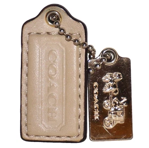 COACH Ivory-Cream Leather & Polished Light Brass Tag Fobs - Picture 1 of 6
