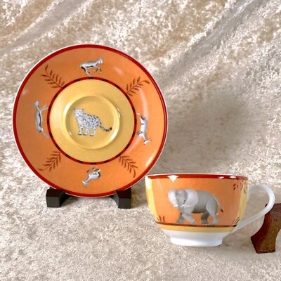 Taza de té y platillo Hermes África vajilla de porcelana naranja Foto 1 de 4