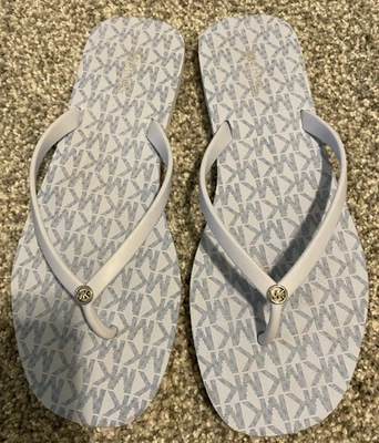 MUJER MICHAEL KORS AZUL CLARO FIRMA CHANCLAS TANGA 9 M Foto 1 de 3