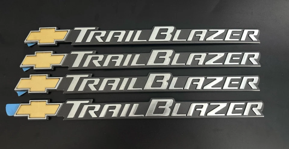 OEM Factory GM Chevy Trailblazer Emblem Adhesive Badge Front Door 15185711 - Image 1 of 1