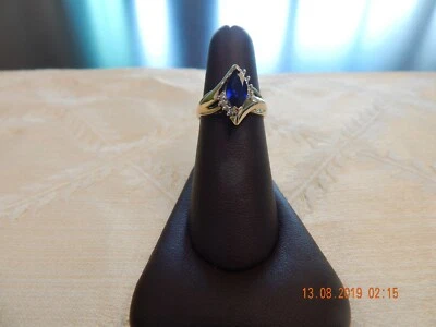 Anillo de zafiro sintético 10k oro amarillo 10 x 5 mm para dama, talla 6 1/2 Foto 1 de 4
