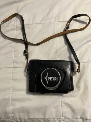 Telémetro vintage Petri 7 35 mm con lente Orikkor 45 mm F2,8 y estuche de cuero Japón Foto 1 de 4