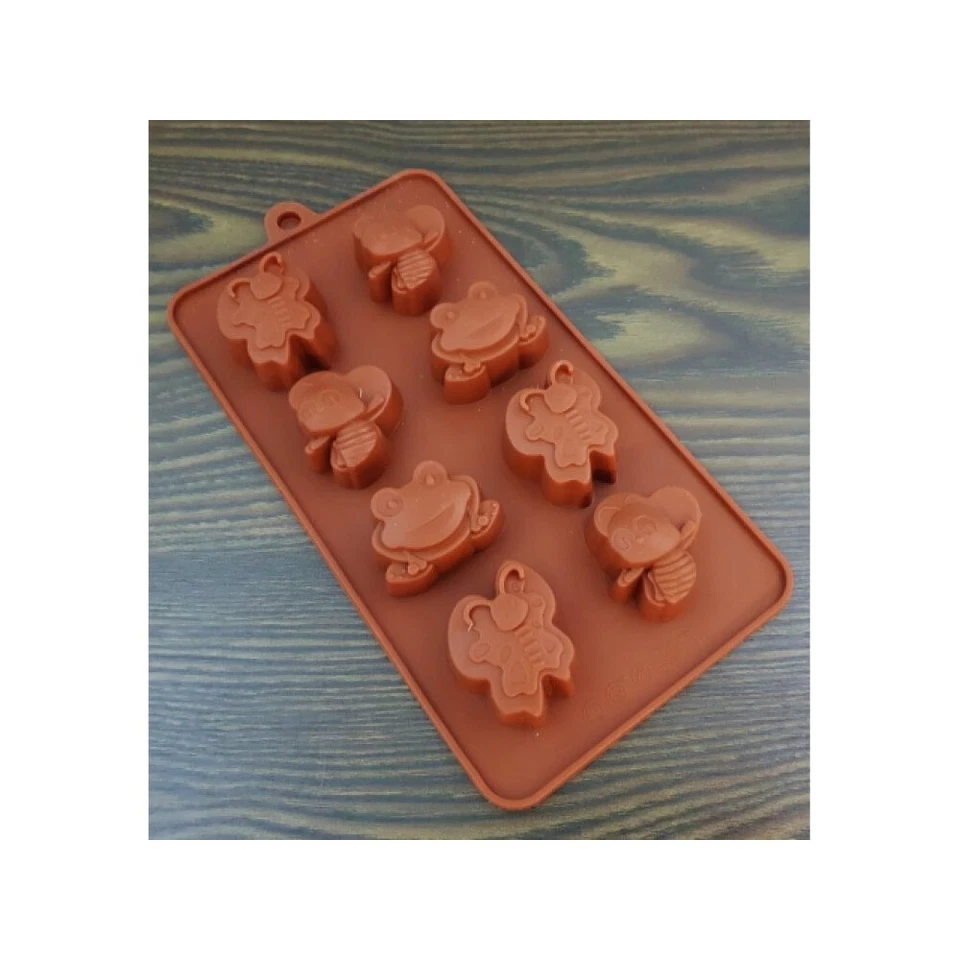 Silikonform für Schokolade Pralinen verschiedene Motive 8 Stück - Bild 1 von 1