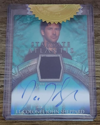 Stargate Atlantis Seasons 3 & 4 Joe Flanigan Costume Relic Autograph Un-Numbered - Image 1 of 2