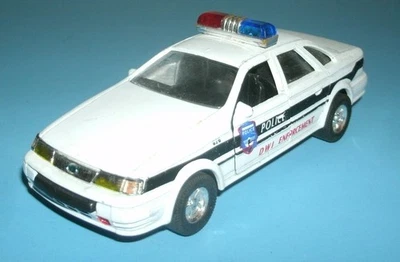 Литая модель полицейского автомобиля Ford Taurus 1980-е масштаб 1:38 (5 дюймов) игрушка Schylling - Изображение 1 из 4