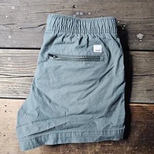 Vuori Shorts Damen klein grün Reißverschlusstasche Athleisure Laufen Training Outdoor - Bild 1 von 7