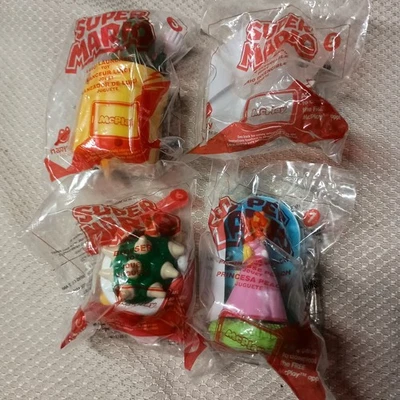 Lot (4) NEW Super Mario Toys Luigi Bowser Princess Peach Invincible Mario 2017 - Image 1 of 4