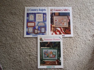 3 BARBARA MOCK Kreuzstichkarten COUNTRY ANGELS ABC'S SUMMER HOMES Maße - Bild 1 von 3