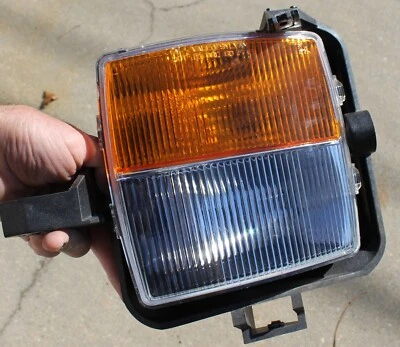 Оригинальный новый левый противотуманный фонарь/сигнал поворота для Cadillac CTS 2003-2007 годов выпуска 25742395 - Изображение 1 из 4