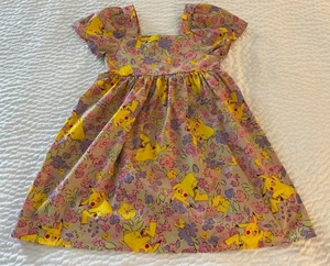 Mädchen Pokemon Pikachu Rosa Gelb Blumen Kleid Größe M (8) - Bild 1 von 7