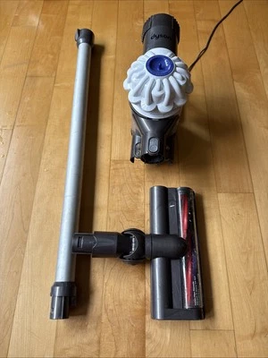 Dyson V6 Cordless Vacuum, charger, wall mount, tube, battery, brush fully tested - Image 1 of 4