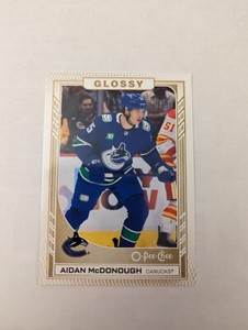 2023-24 UD Upper Deck Series 1 OPC Glossy Gold R-13 Aidan McDonough - Vancouver