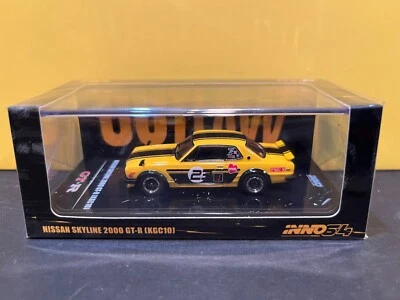 1/64 INNO64 NISSAN SKYLINE 2000 GT-R KGC10 #23 AMARILLO Y NEGRO Foto 1 de 4