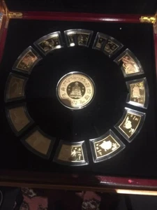 CHINESE CALENDAR BUDDHA MEDALLION - 12 LUNAR GOLD PLATED COINS - Picture 1 of 12