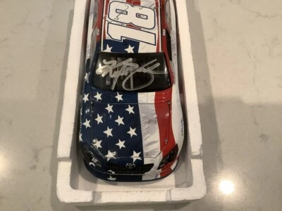KYLE BUSCH AUTOGRAPHED 2011 TOYOTA CAMRY M&M'S RWB 911 TRIBUTE DIECAST & CARD - Image 1 of 4