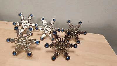 Juego de 5 servilletas de metal para copo de nieve con pedrería azul Foto 1 de 4