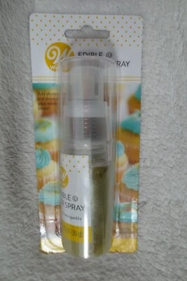 Spray brillo comestible Wilton. Cupcakes para decorar pasteles dorados de 0,35 oz Foto 1 de 4