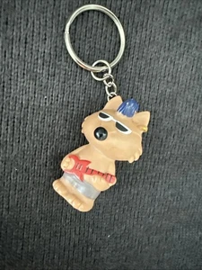 Llavero rockero punk wolf marrón Star Awards GA School Store - guitarra roja, f8 - Imagen 1 de 7