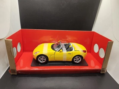 Pontiac Solstice 2006 firma de carretera amarilla 1:18 Foto 1 de 3
