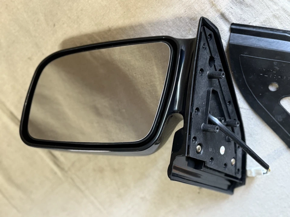 Espejo retrovisor lateral izquierdo eléctrico nuevo de stock Mazda MPV 1989-1998 pieza # 955-410 Foto 1 de 4