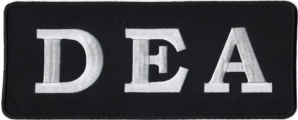 Chaqueta negra DEA parche trasero agencia antidrogas utilería de película bordada Foto 1 de 1