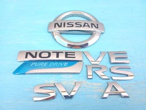 NISSAN VERSA CHROME SV LETTERING EMBLEMS WITH NOTE AND PURE DRIVE LOGO OEM USED - Picture 1 of 6