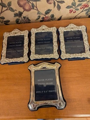 4-VINTAGE SILVER PLATED PHOTO FRAMES 3X5 NOS - Image 1 of 4