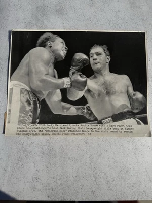 “Legendary  boxer Rocky Marciano” punching Archie Moore 1921 Yankeee Stadium - Image 1 of 2