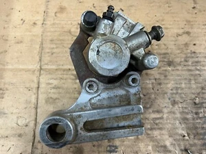 1988 KAWASAKI KX250 REAR BRAKE CALIPER AND MOUNT 1987-1988 KX125 KX250 KX500  - Picture 1 of 8