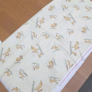 Clothworks Guess How Much I Love You Hares Yellow Fabric 100% Cotton 112cm x 1m - Picture 1 of 3