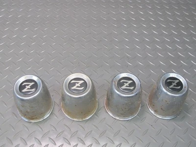 77-78 DATSUN S30 280Z JUEGO DE 4 CUBIERTAS DE TAPACUBOS DE RUEDA OEM Foto 1 de 4