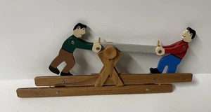 Vintage Primitive Folk Art Lumberjack Men Chopping Wood with Saw - Picture 1 of 10